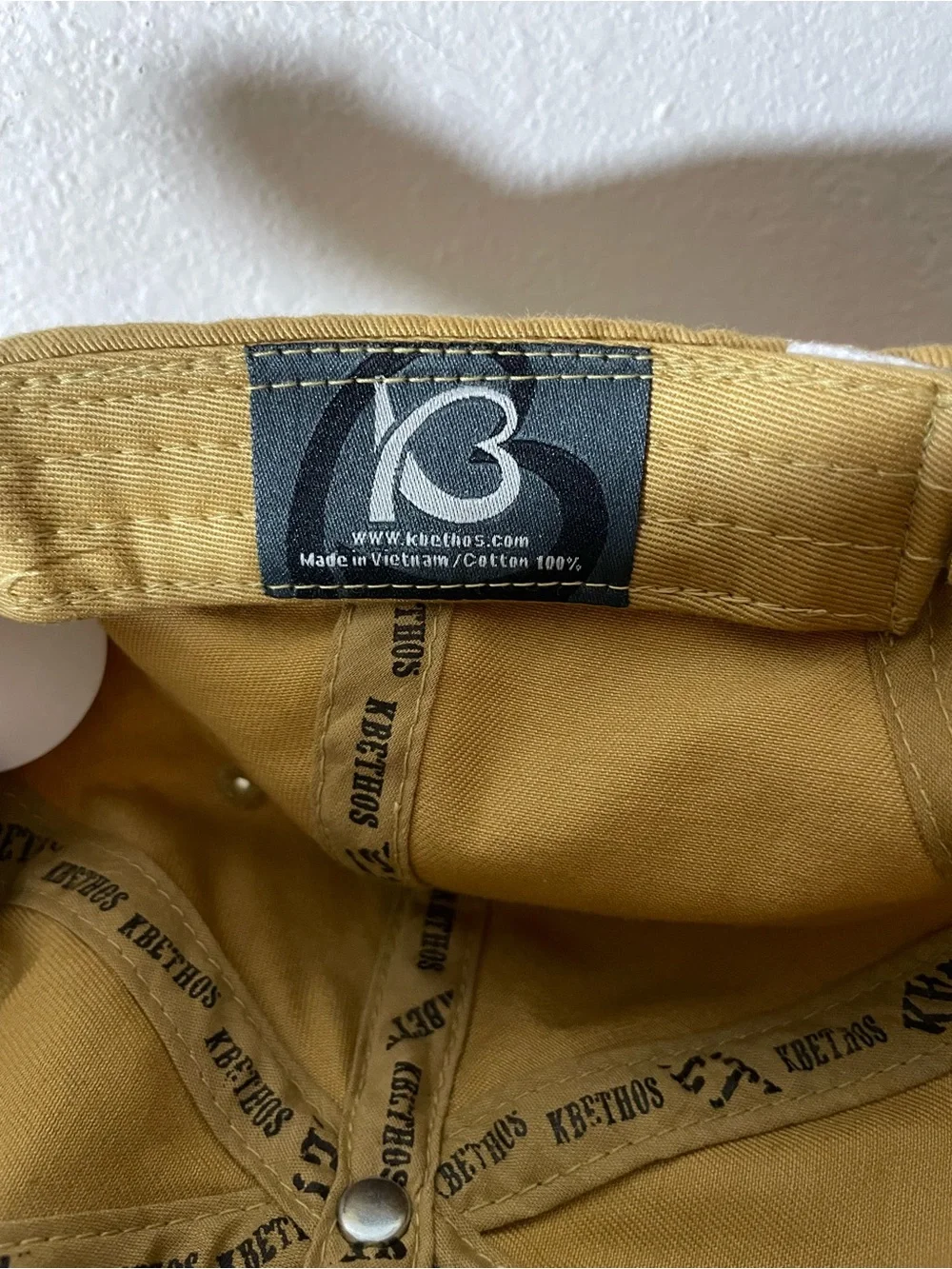 KBETHOS Mustard Yellow Embellished Cross Cap with Orange Accent